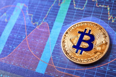 Golden bitcoin on chart. Finance trading