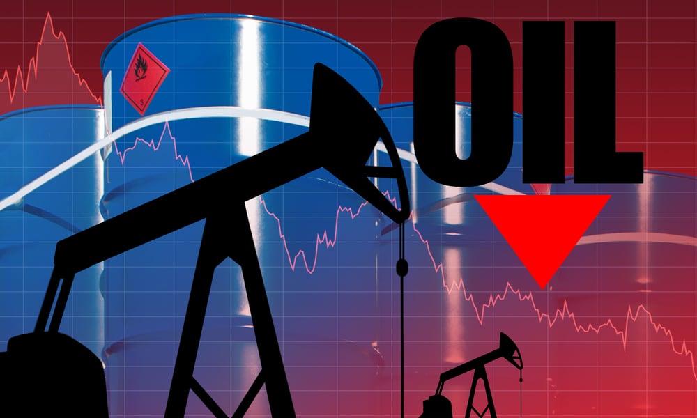 Decline in crude oil prices. The inscription oil on the background of falling charts. Concept is overproduction. Surplus petroleum in barrels. Concept - oversupply of oil led to a fall in prices