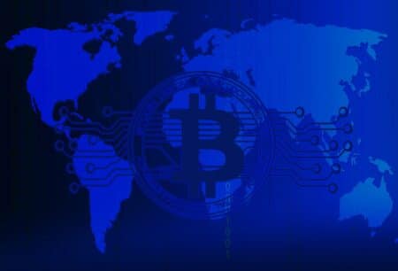 Abstract technology bitcoins logo with circuit line on world map,blue technology background