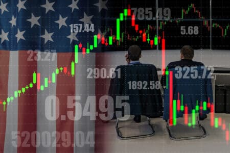 Exchange trade. Brokers on the background of the American flag and fluctuations in stock prices. Falling stock prices of American companies. American stock market.