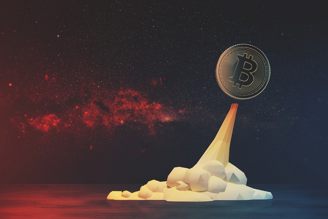 Glowing bitcoin flying like a rocket against a red open space background. Concept of mining. Mock up toned image Elements of this image furnished by NASA
