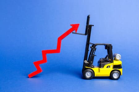 A yellow forklift raises a big red arrow up.
